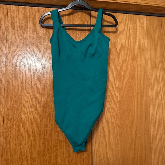 OQQ Tops - Teal form fitting body suit tank
